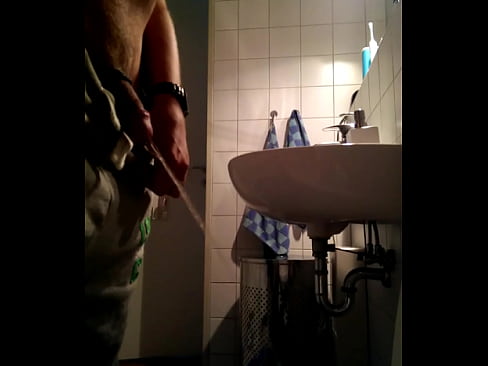 My uncut cock pissing