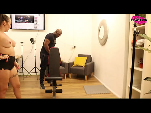 Black gym instructor on white woman's back e1 p1