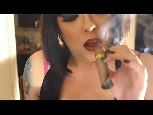 Chubby Domme Smokes A Cigar