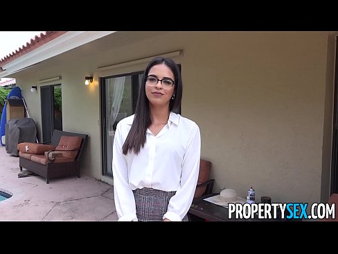 Attractive real estate agent wearing glasses with a natural fit body fucks handyman's big cock then lets him cum all over her pretty face