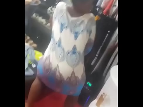 African woman twerking big booty in public