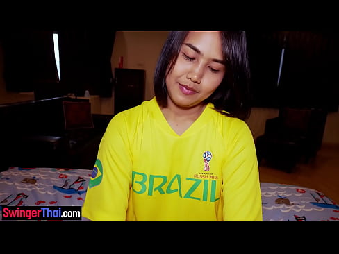 Asian teen hottie in a World Cup jersey gives head and bounces on top of a hard cock