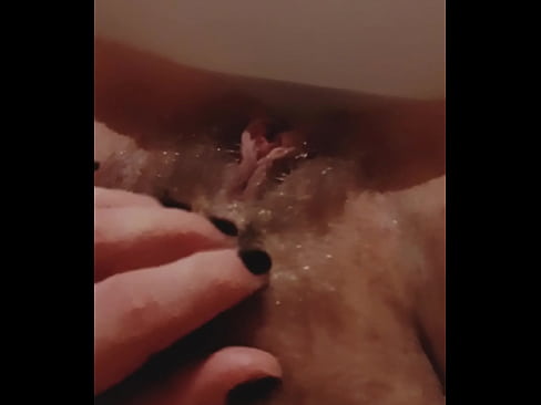 Petite MILF with big pussy lips playing with hairy pussy