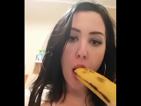 Slut at home practicing deep throat with banana