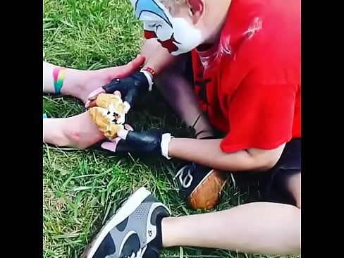 FlipFlop The Clown Having A Foot From CherryPye's Feet At The 2018 Gathering Of The Juggalos – Clip # 1