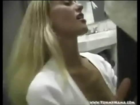 Slutty housewife gives a blow job and gets fucked in mens restroom taking a massive load on her face!