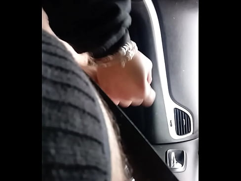 Chubby wife gives handjob while driving