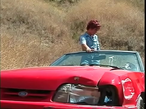 Redhead young floozie was fucked  in his red cabriolet-sedan