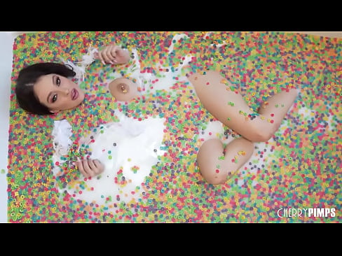 This solo scene with Cherry of the Month Maddy May is playful and fun as she rolls around in a tub of cereal. You'll want to eat her up while she plays with her big tits.