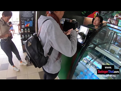 Thai teen girlfriend pleases her boyfriend in public in the back of a coffee shop