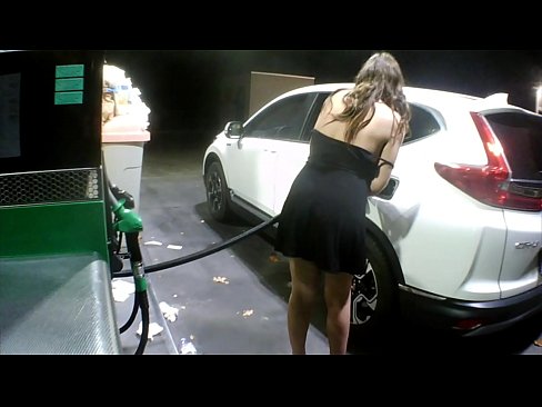 Flashing my breasts, pussy and ass while refueling the car