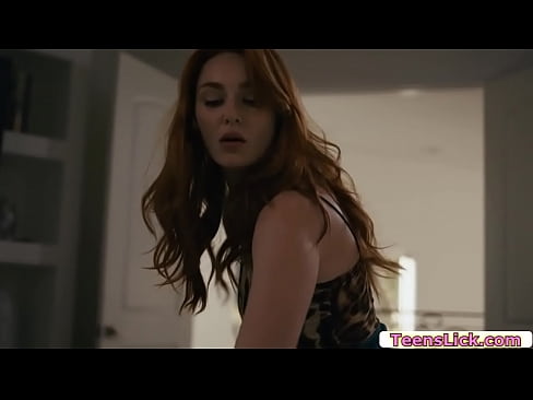 Gorgeous redhead gets back home because she forgot her iPad.After that,she hears a moan in her room and she saw her best friend already naked in her bed, while her husband hide.She gets a big dildo and she then puts it inside her friends ass.