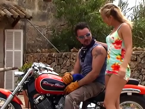 Hot blonde Nicoletta sucks cock then takes it a front of bike outdoor