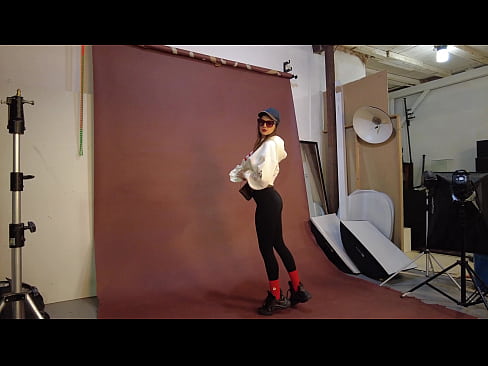 Maria stripping for photographer