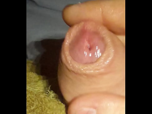 Pulling dick cum out in bed