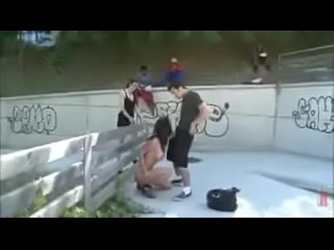 Threesome with audience in public park