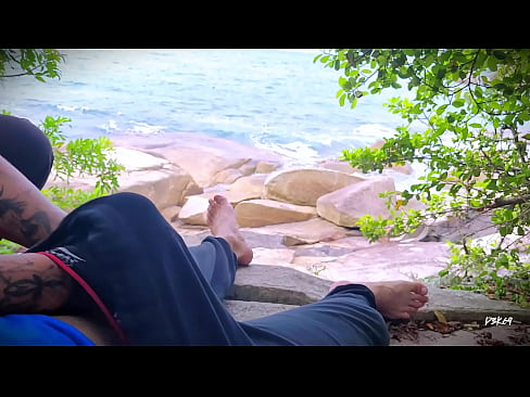 Surprise ejaculation handjob on the beach