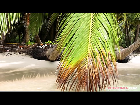 Sexy Asian Model Putri Cinta naked on a beautiful tropical beach