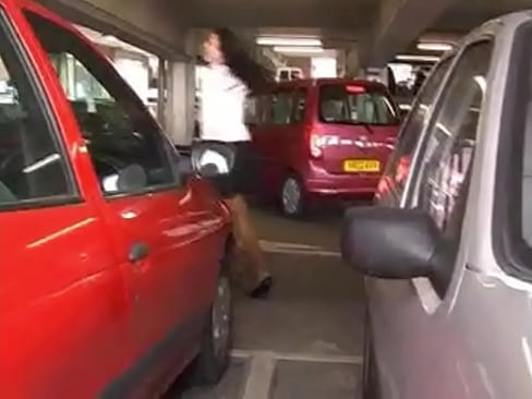 Gorgeous brunette in heels and short skirt has a big load pee in a car park