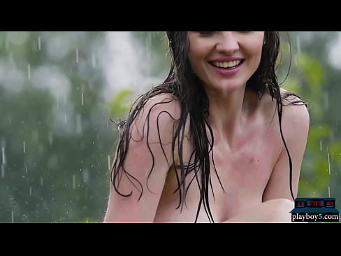 Ukrainian MILF beauty with a firm butt goes nude in the rain and gets wet