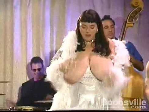 Candye Kane sings and plays the keyboards with her huge tits