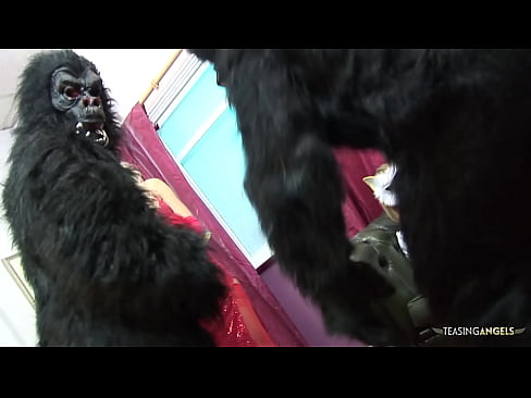 Nothing makes these blonde chicks happier than pleasing two guys in gorilla suits by sucking their delicious dicks before getting their tight pussies screwed hard.