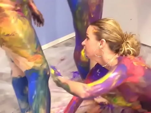 Four lesbian bitches hand paint their skin on the floor