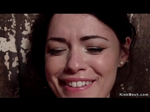 Gagged brunette slut in standing bondage gets tormented  Gagged brunette slut in standing bondage gets tormented