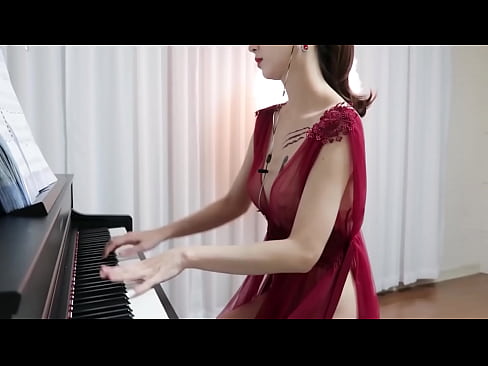 Sexy lady playing piano.
