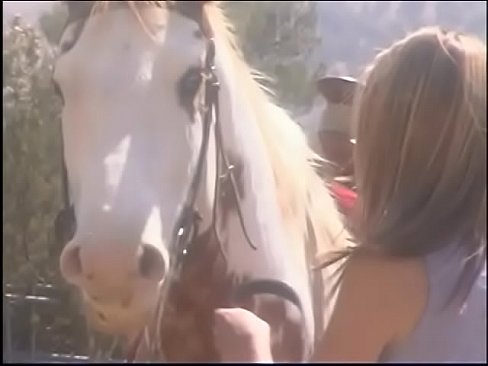 Charming blonde babe April Flowers goes  horse riding with rugged outdoorsman yardman