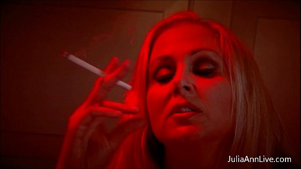 Hot Horny Milf Julia Ann is a cigarette but she wants more in her mouth! Like a hard cock! See the full unedited video and much more at Julia's official site with free member shows!