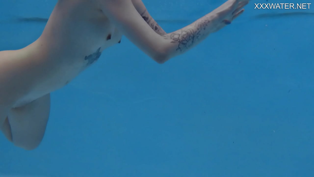 Finnish teen babe Mimi Cica cutest pornstar with tattoos in swimming pool nude