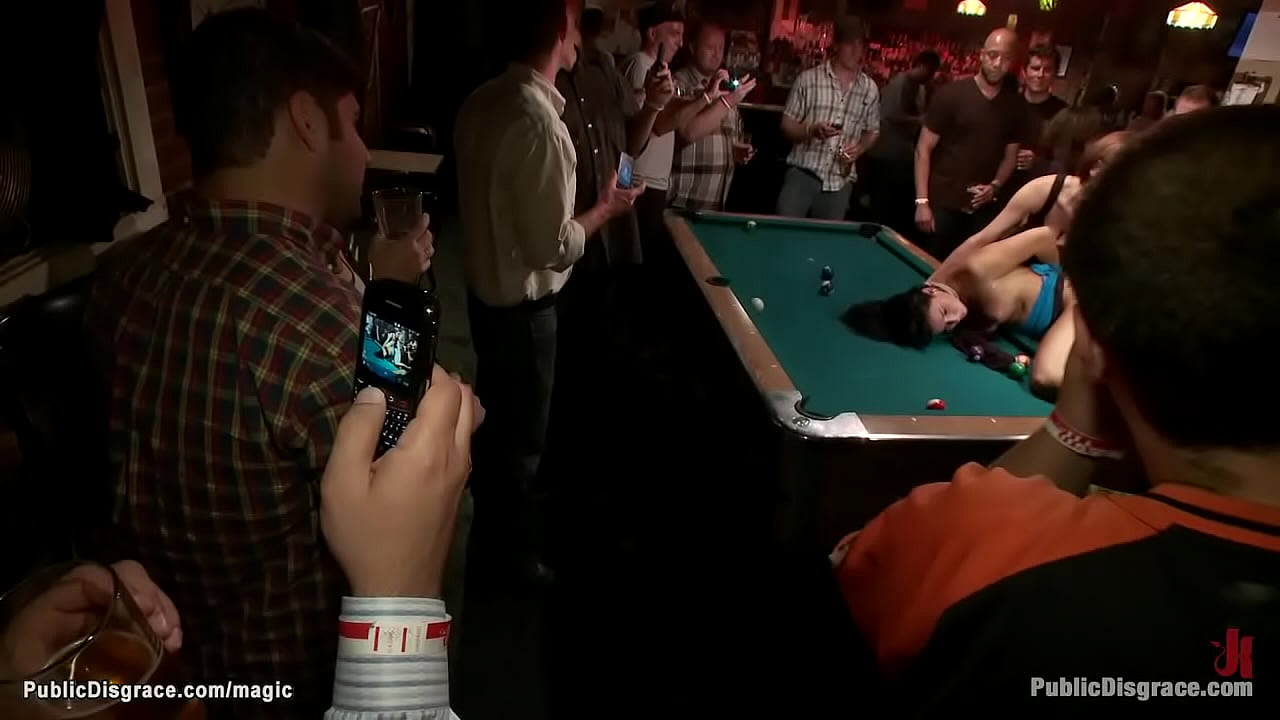 Busty brunette slave Aria Aspen with hands tied behind back gets spanked and gaped by dom Princess Donna Dolore then fucked by Mr Pete in public pool bar