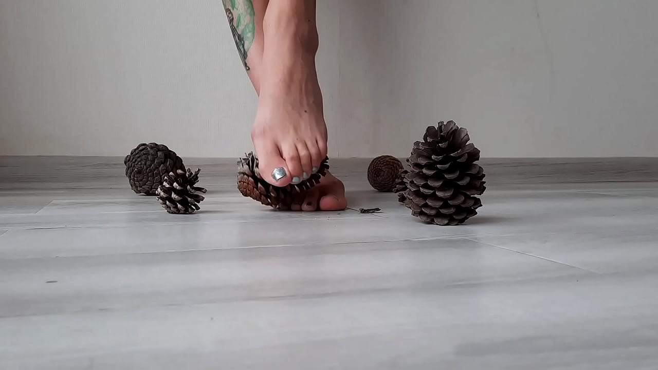 Mistress makes herself a self-massage of the feet with bumps. Foot fetish. Sexy toes