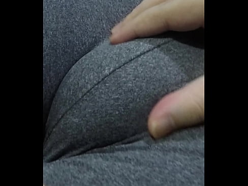 I filmed my step sister lying on the bed in her tight shorts on her big pussy and I asked her to let me squeeze her cameltoe