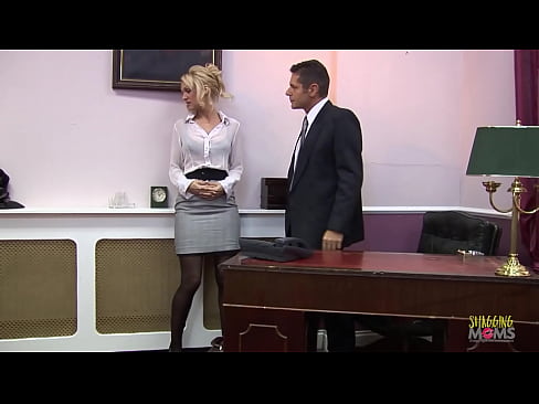 Nothing could prepare this blonde milf secretary for that moment. Her boss called her to his office. Instead of work, he was all over her. In the end, she agreed to suck his dick and fuck on his desk.