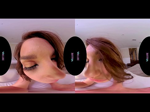 Petite brunette with small tits masturbating with a vibrator in virtual reality