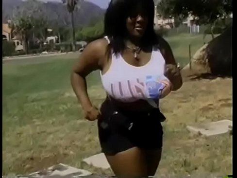 Busty ebony whore with big butt loves to fuck doggy style on a park bench