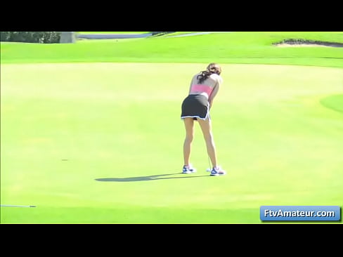 Watch this  hottie teenager reveal her wet pussy and juicy ass on the golf filed