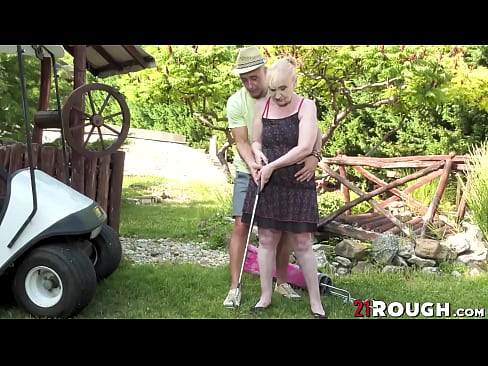Granny bangs golf instructor outdoor