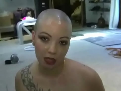 Bald girl obeys