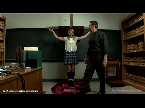 Blonde bully student Amanda Tate is bound to wooden cross by priest Steven St Croix then tormented and throat fucked till ass paddled in classroom