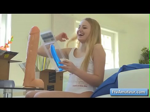Cutie teenager blondie girl unpack sex dildos and start enjoy them