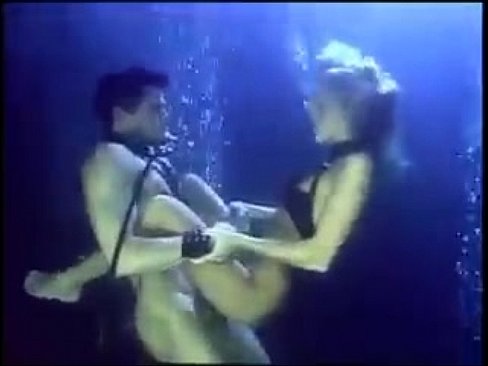 Sandy Knight and Robyn Foster in a threesome underwater