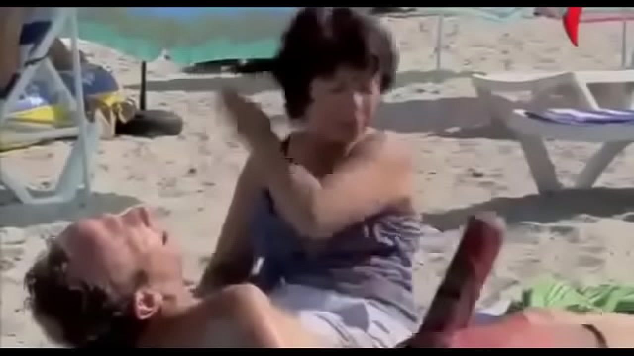 Funny video where a man is u. is taken out of the water and he has a big dick sticking out of his underwear! A man is taken out and specially laid down near girls