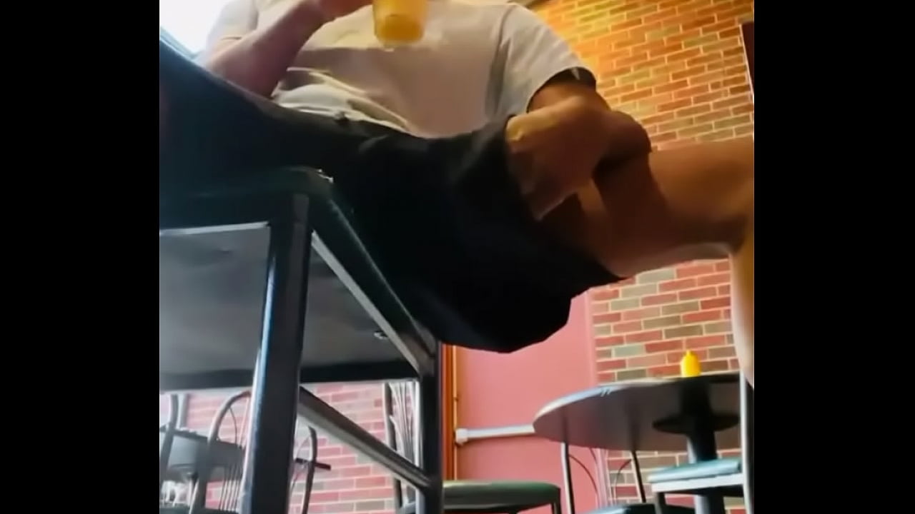 Jerking my big dick in public restaurant