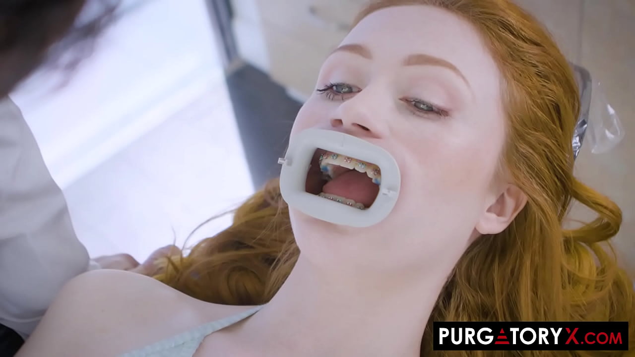 Horny little redhead fucks her dentist in the office
